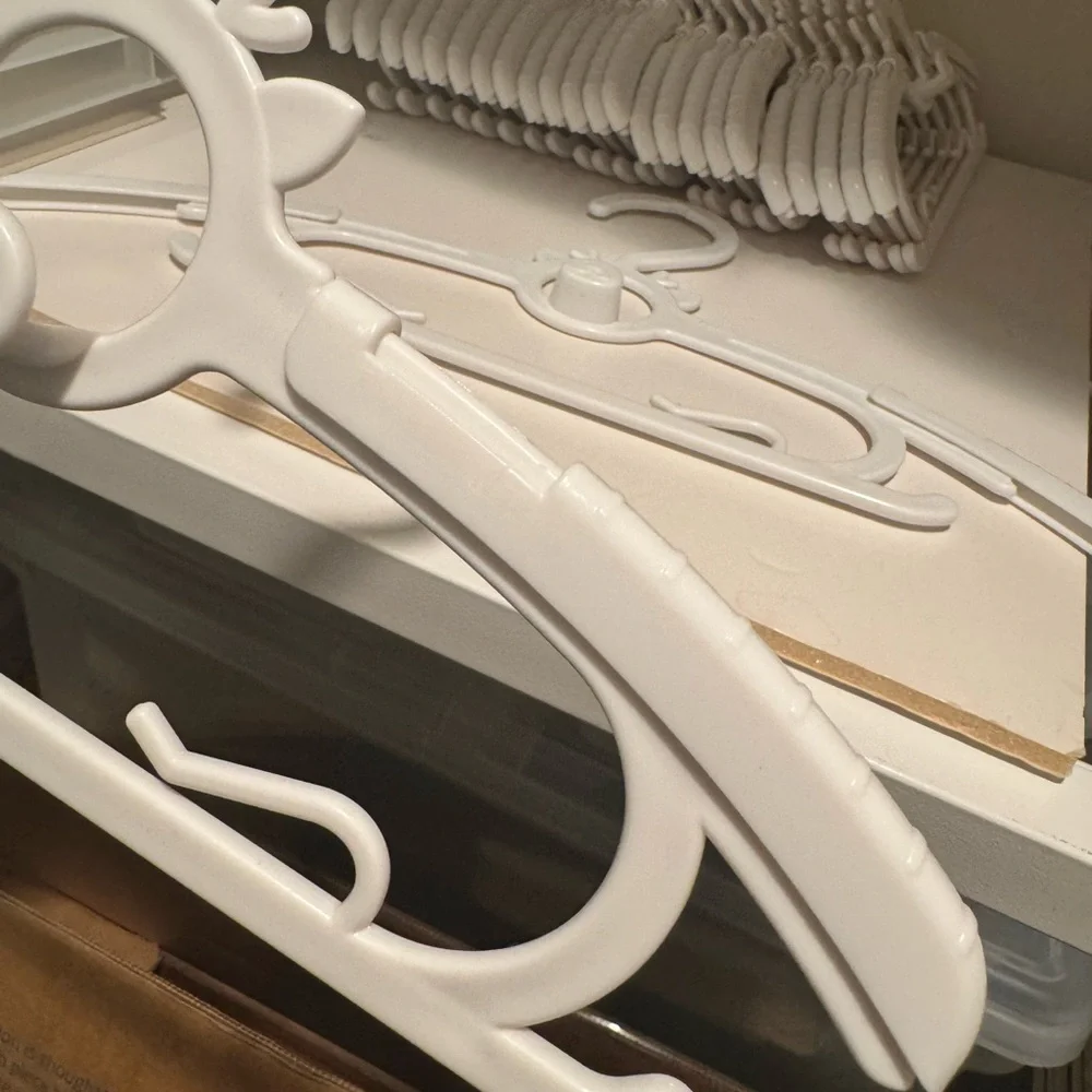 Plastic infant/child adjustable and stackable Hangers with Cute Design